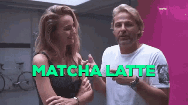a man and a woman are standing next to each other with the words matcha latte written in green
