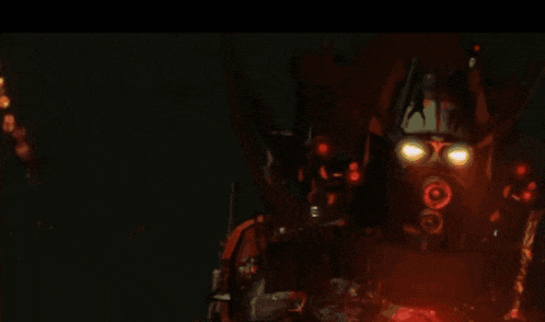 a man in a gas mask is holding a pair of lasers