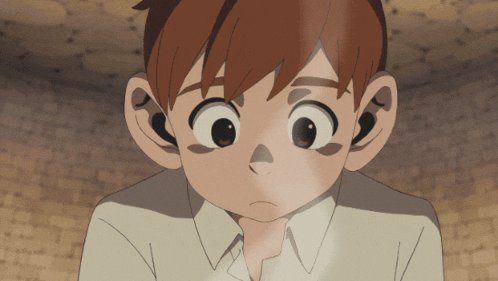 a close up of a cartoon character 's face with big eyes