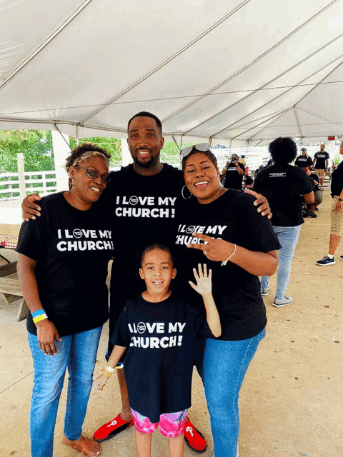 a group of people wearing i love my church t-shirts