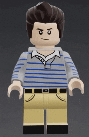 a lego man wearing a blue and white striped shirt and khaki pants