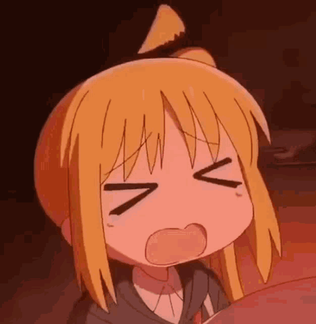 a close up of a cartoon girl with a ponytail making a funny face .