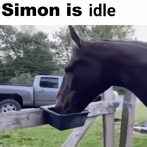 a horse is drinking water from a plastic container attached to a fence .