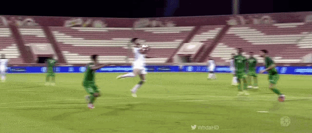 a soccer game is being played in an empty stadium sponsored by windahd