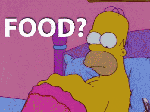 homer simpson is laying in bed with the word food written above him