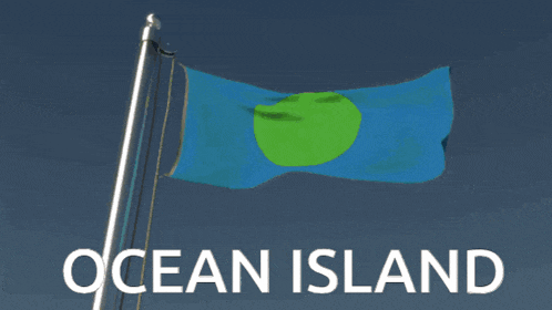 a blue flag with a green circle on it and ocean island written below it