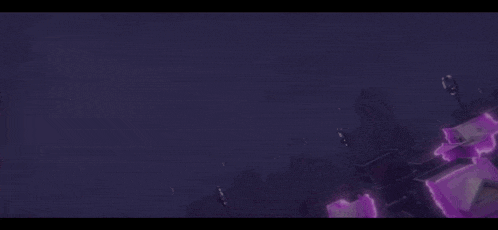 a purple light is coming out of a purple object .