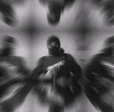 a blurry photo of a person with a mask on their face