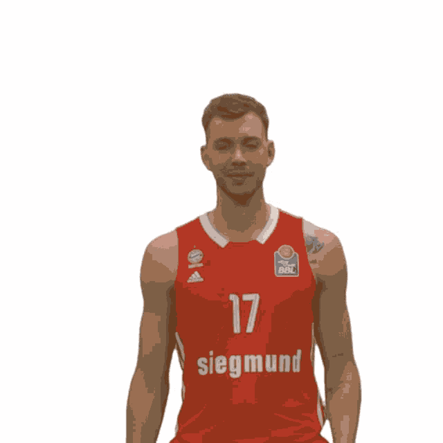 a man in a red siegmund basketball jersey giving an ok sign