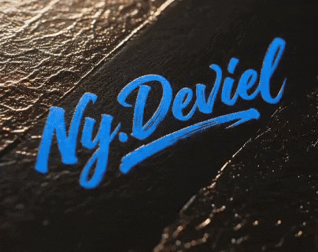 the name ny deriel is written in blue on a dark surface