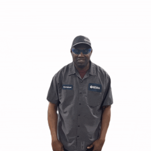 a man wearing sunglasses and a shirt that says ' emanuel ' on it