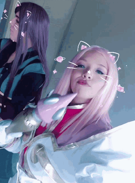 a woman with pink hair has a cat ear on her head