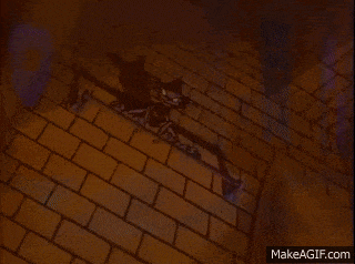 a cartoon of a purple monster with yellow eyes is on make a gif.com