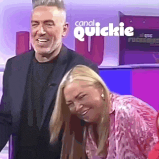 a man and a woman are smiling in front of a sign that says canal quickie