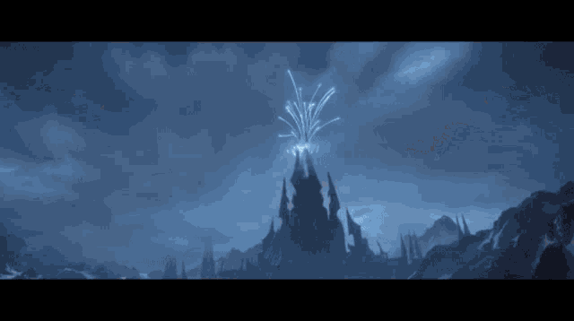 a castle with fireworks coming out of it in the sky
