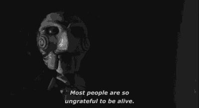 a black and white image of a puppet with the words `` most people are so ungrateful to be alive '' .