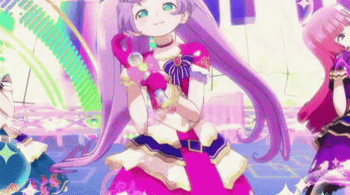 a girl in a pink dress is holding a microphone in her hand .