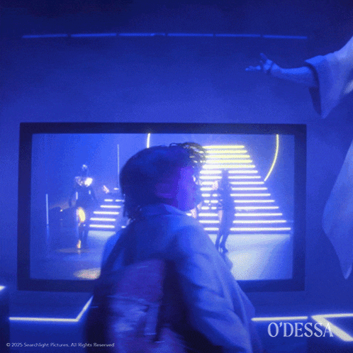 a poster for odessa shows a man in a white suit