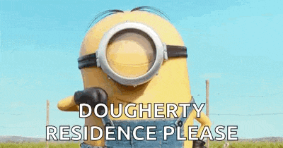 a minion from the movie despicable me is holding a gun .