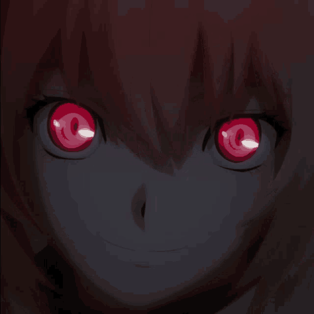 a close up of a person 's face with glowing red eyes