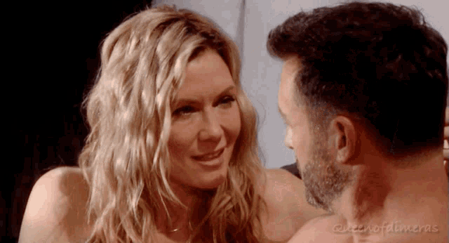 a man and a woman are looking at each other with the words queen of palmeras in the corner