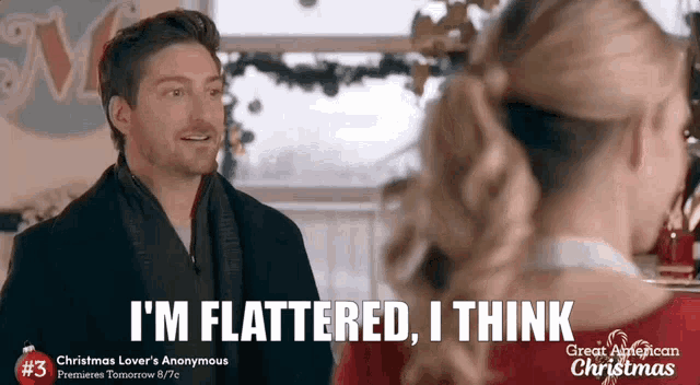 a man is talking to a woman in a restaurant and saying `` i 'm flattered , i think ''
