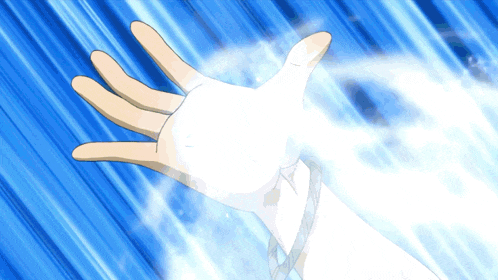 a person 's hand is reaching out towards a white object