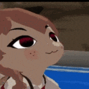 a close up of a cartoon character 's face with red eyes looking at the camera .