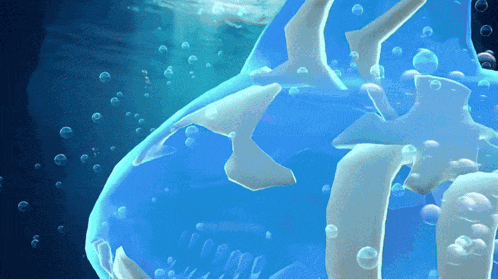 a shark is swimming in the water with bubbles around it