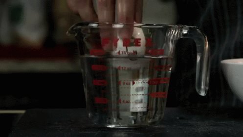 Old Eggs Stand Upright Or Float GIF - Egg Old Glass Of Water GIFs