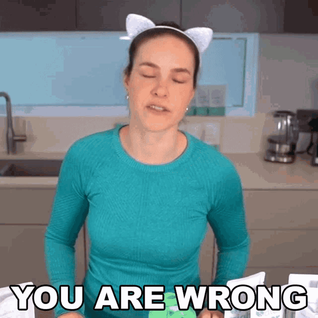 a woman wearing a cat headband says you are wrong