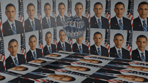 a bunch of pictures of barack obama are lined up on a table