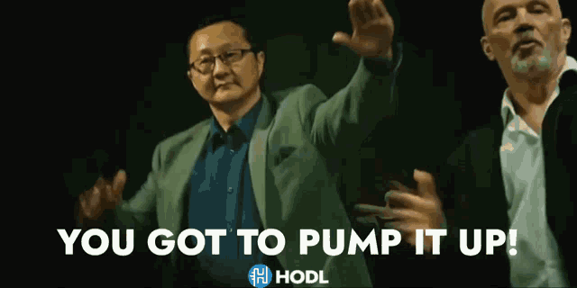 two men in suits are dancing with the words you got to pump it up in the background