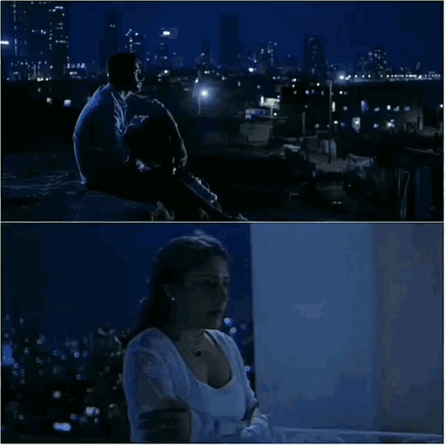 a man and a woman are sitting on a ledge at night