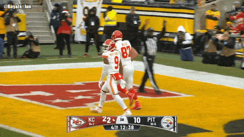 a football game is being played between the chiefs and steelers