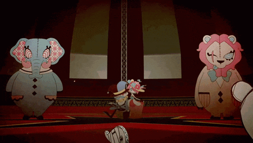 an elephant and a lion are standing next to each other on a stage