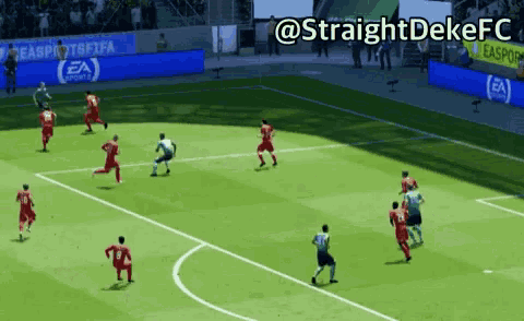 a soccer game is being played on a field with a banner for ea sports
