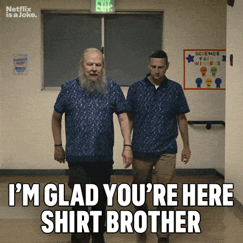 two men walking down a hallway with a sign that says science fair winners on it
