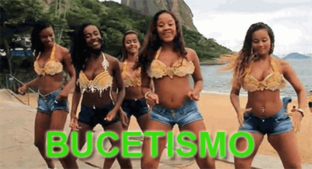 a group of women in bikinis and shorts are dancing on a beach with the word bucetismo in green letters .