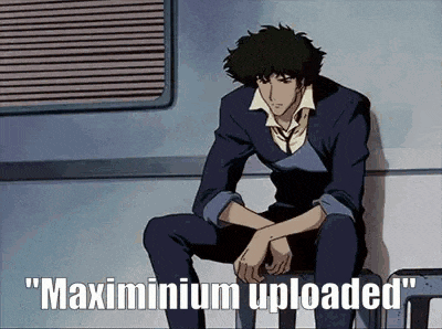 a man is sitting on a chair in a room with the words `` maximium uploaded '' written on it .