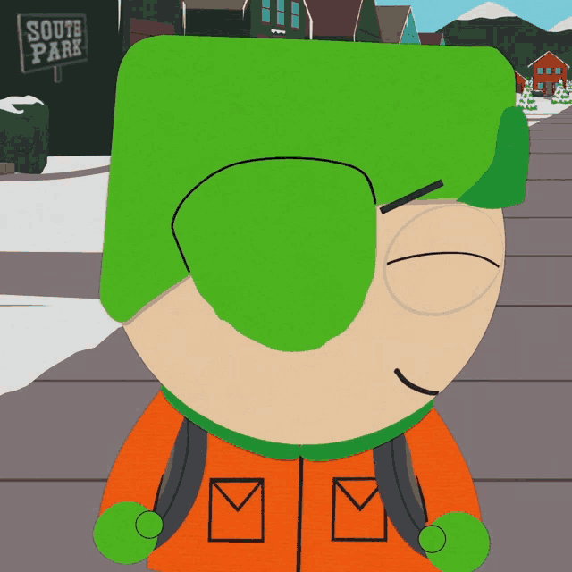 a cartoon character with a green hat is standing in front of a south park sign