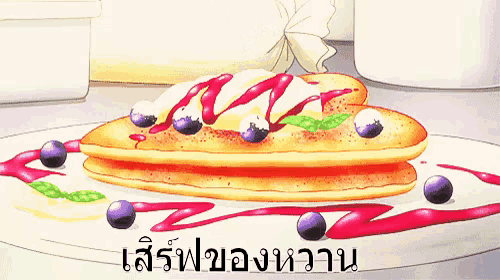 a stack of pancakes with blueberries and syrup on a white plate with chinese writing on it