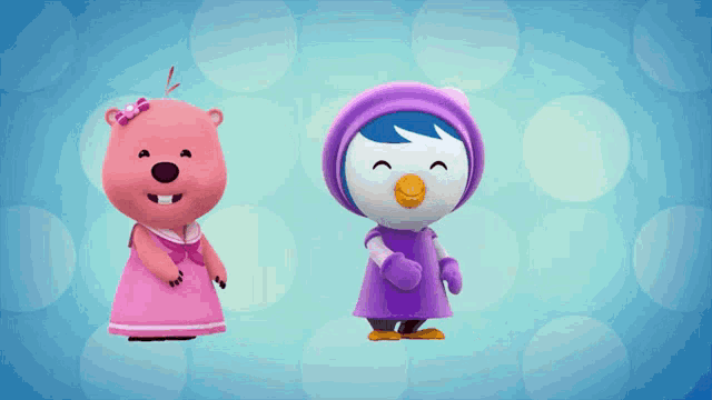 a pink teddy bear and a purple penguin are standing next to each other