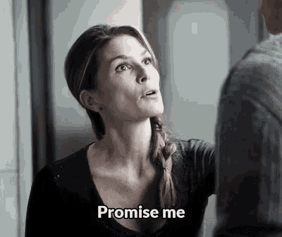 a woman is talking to a man in a black and white photo and says `` promise me '' .