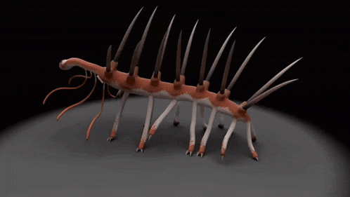 a 3d rendering of a worm with sharp claws and a long tail