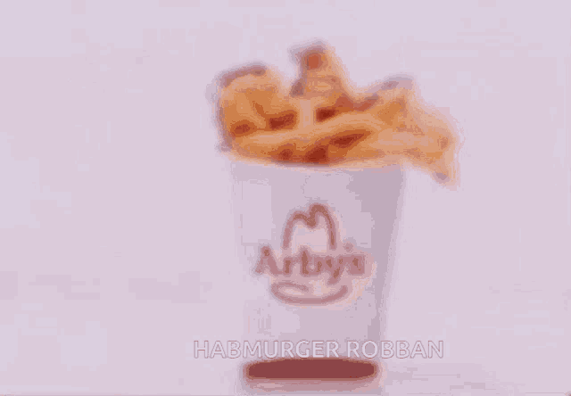 a blurred image of a hamburger robban with a purple background