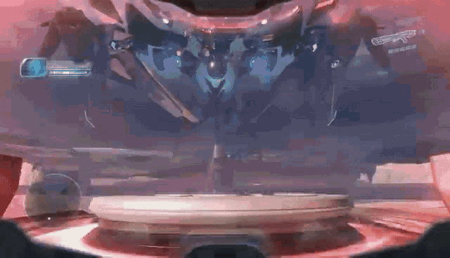 a video game is being played in a room with a robot flying through the air .