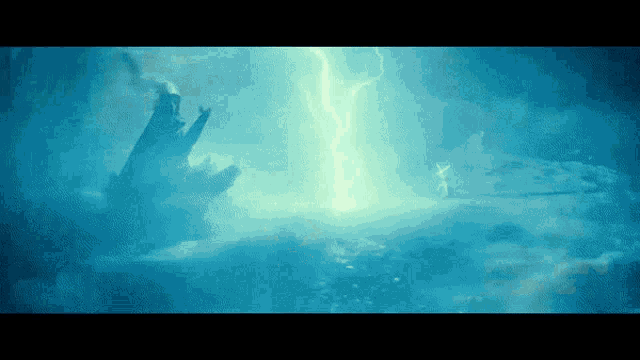 a lightning bolt strikes a cliff in the ocean