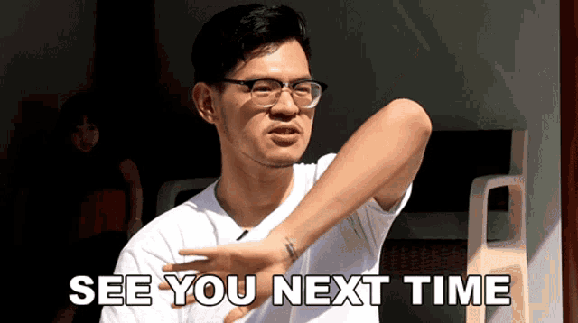 a man wearing glasses says " see you next time "