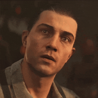 a close up of a man 's face with his eyes closed